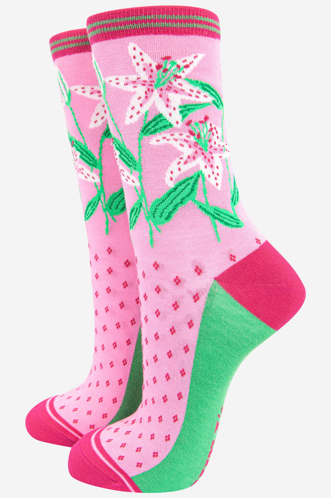 pink bamboo socks with a white lily floral pattern
