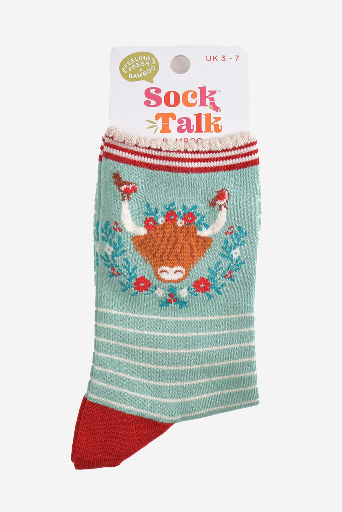 highland cow wreath bamboo socks in their sock talk packaging, these socks are a uk size 3-7
