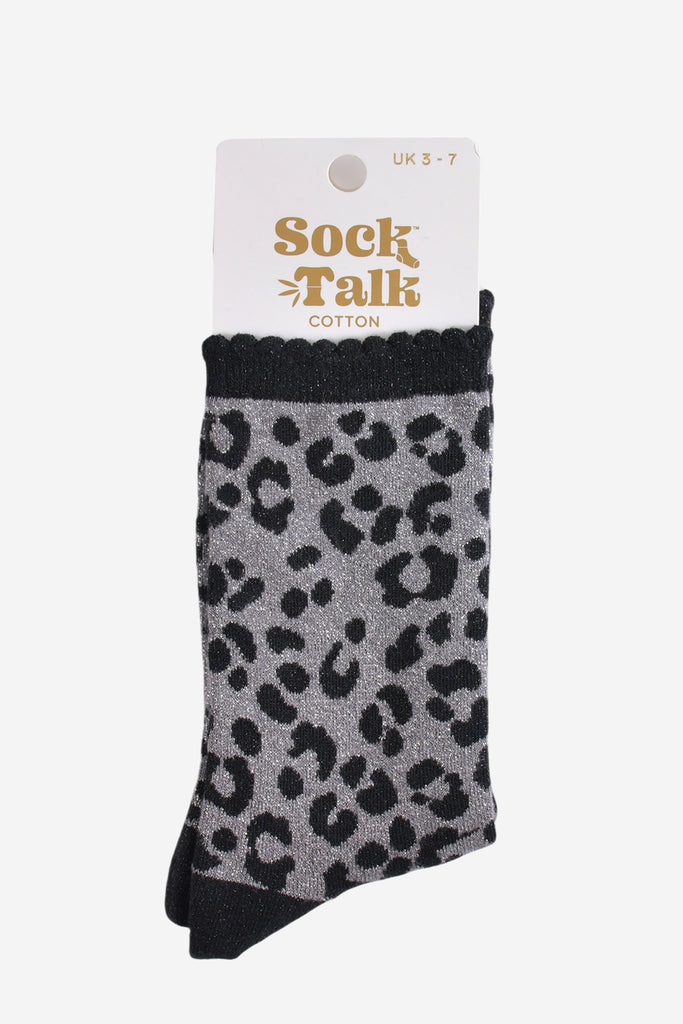 grey and black leopard print glitter socks in their sock talk packaging, these socks are a uk size 3-7
