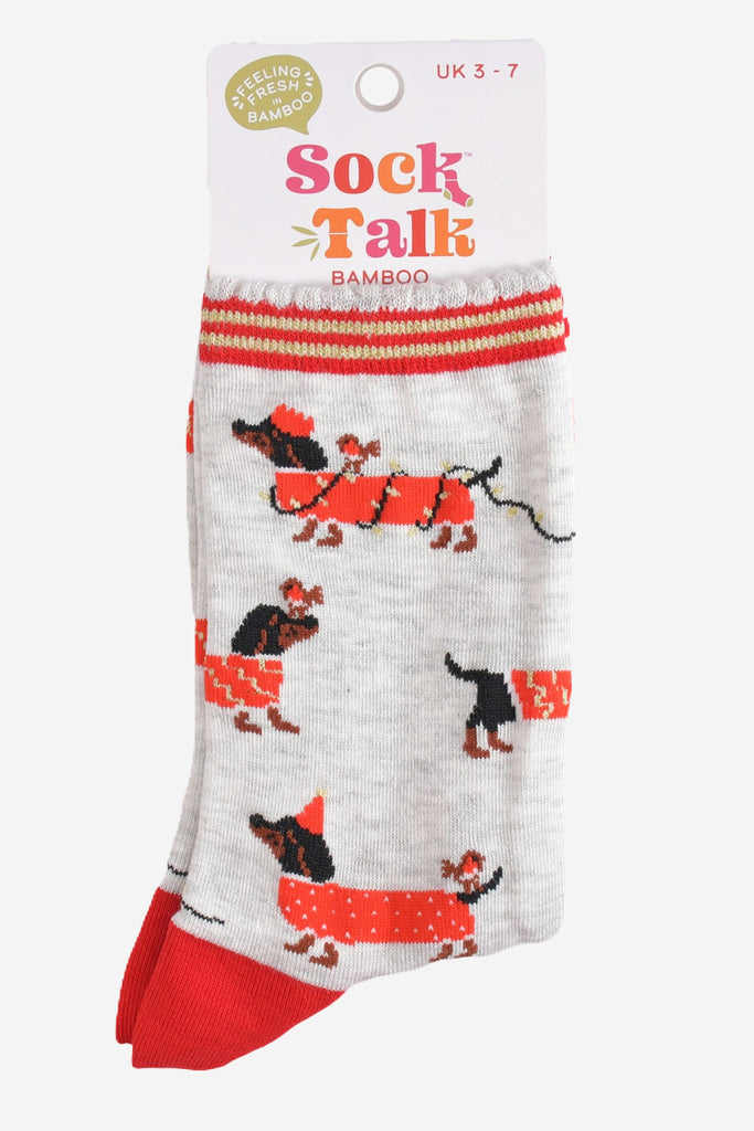 sausage dog and robin bamboo socks in their sock talk packaging, these socks are a uk size 3-7