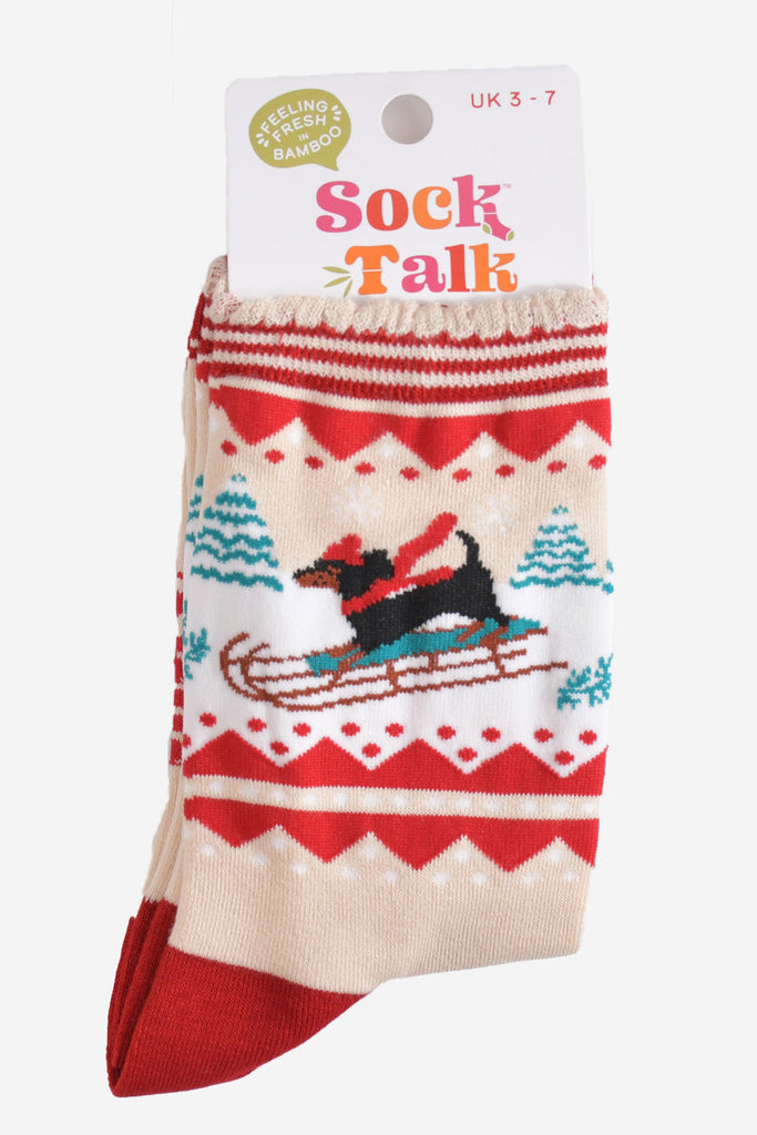 sledging sausage dog bamboo socks in their sock talk packaging, these socks are a uk size 3-7