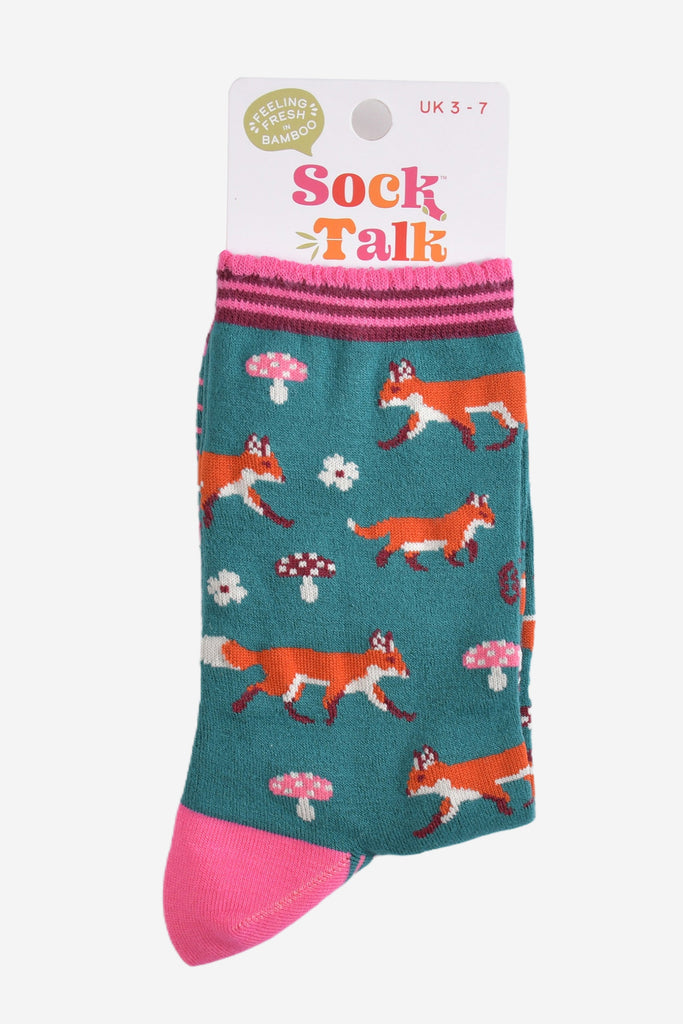 green and pink woodland fox bamboo socks in their sock talk packaging, the socks are a uk size 3-7