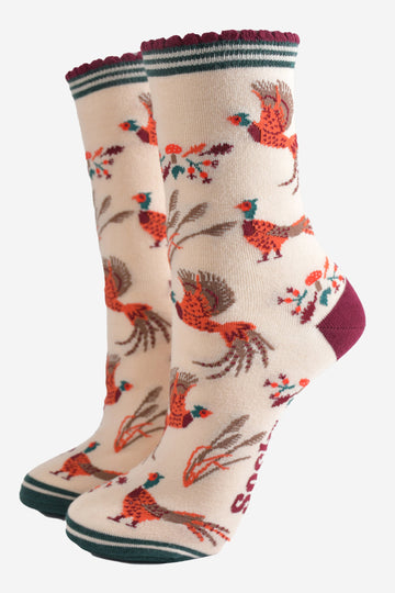 cream ankle socks with a pattern of woodland pheasants and autumnal foliage and toadstools