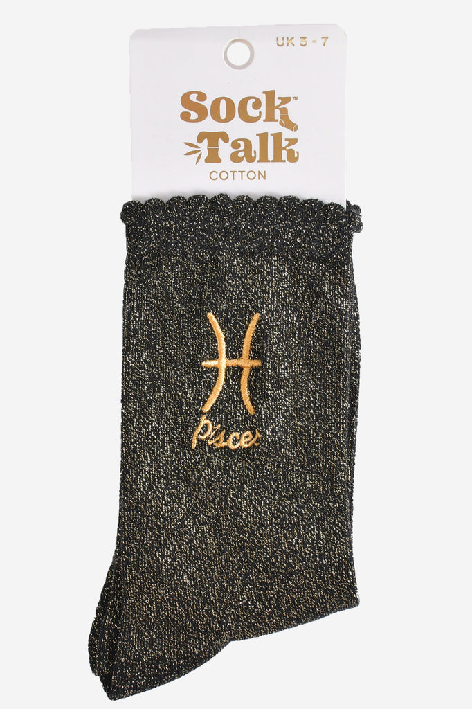 gold and black glitter pisces socks in their sock talk packaging, these socks are a uk size 3-7