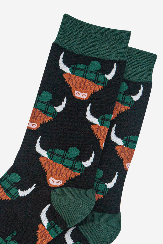 mens-bamboo-socks-black-forest-green-highland-cow-close-up