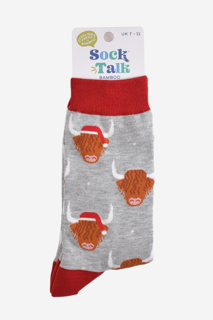 grey and red highland cow santa hat bamboo socks in their sock talk packaging, these socks are uk size 7-11