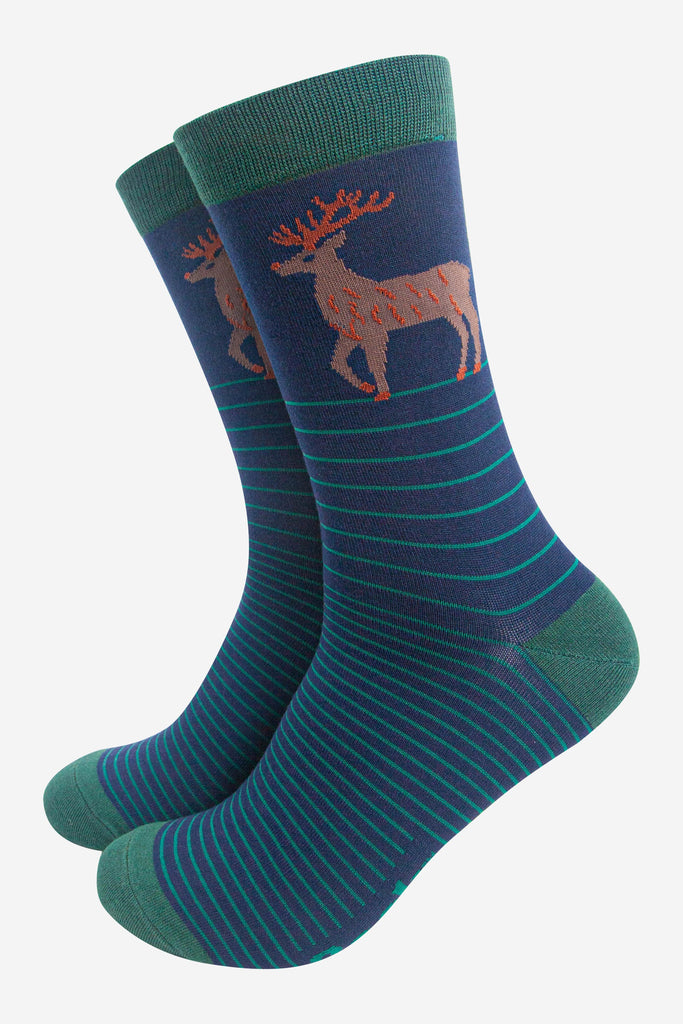 navy blue bamboo crew socks with green stripes and a stag reindeer on the ankle