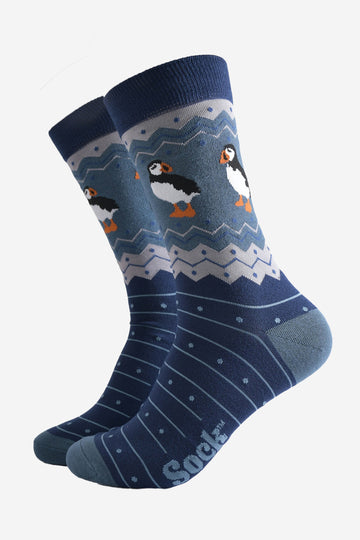 teal socks with fair isle style zig zag stripes featuring a large puffin bird on the ankle