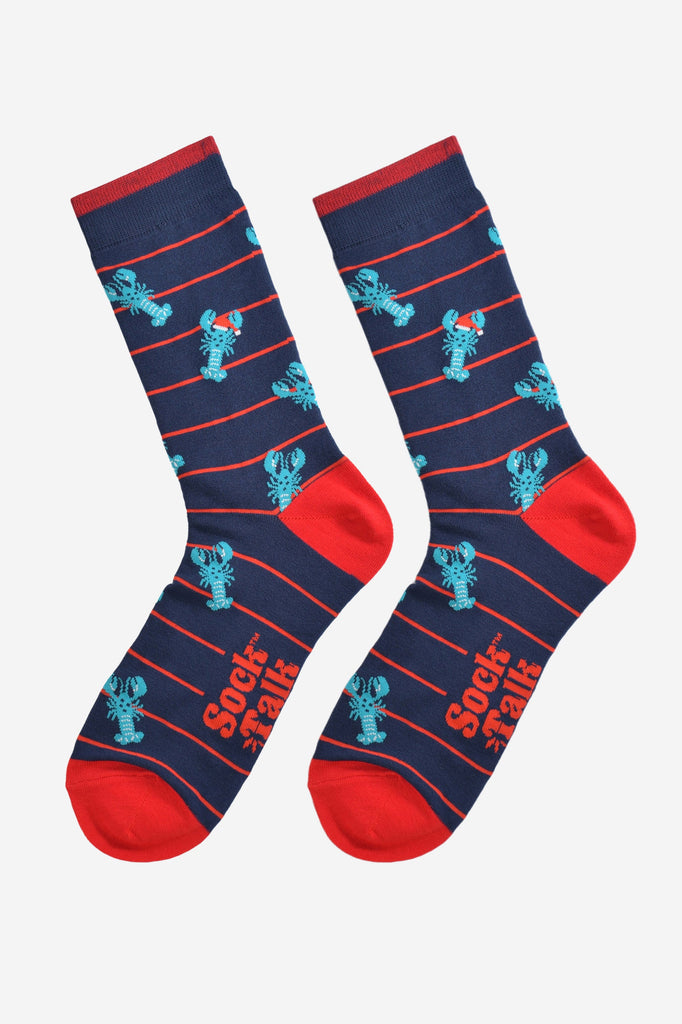 blue lobster socks laying flat, showing the red horizontal pinstripe pattern and blue lobsters wearing santa hats