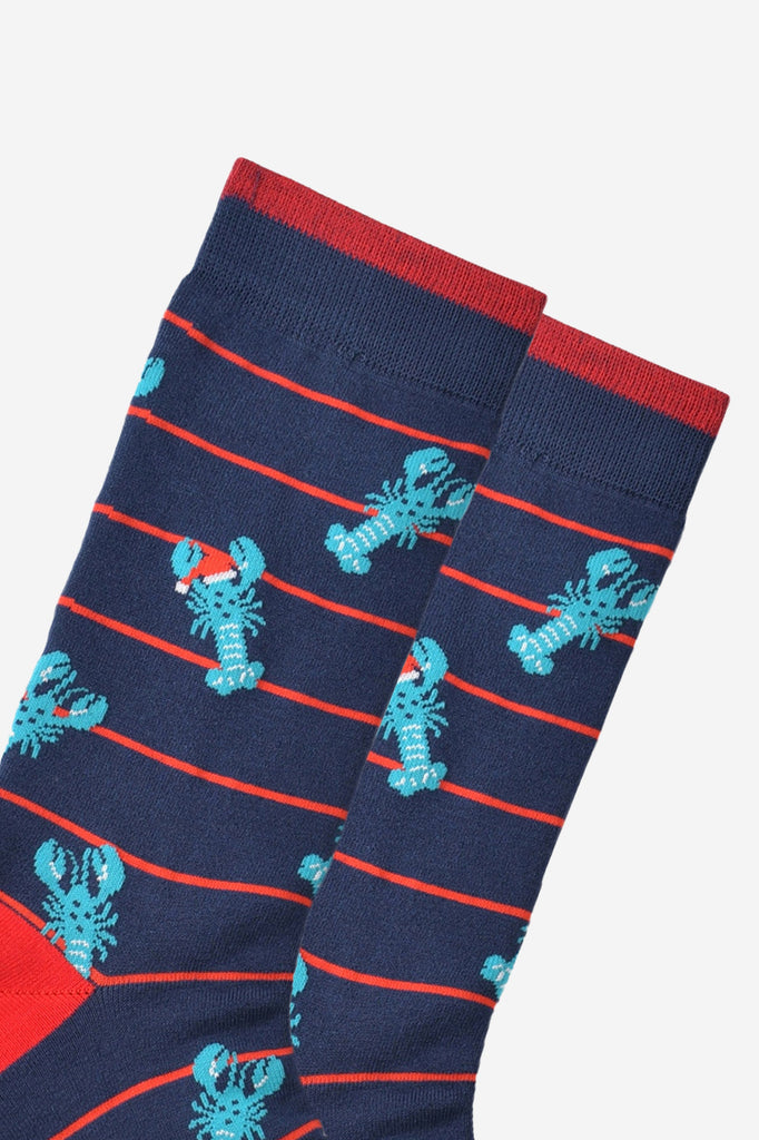 close up of the lobster pattern showing clearly the blue lobsters wearing festive santa hats