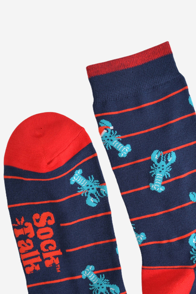 showing the cuff and the toe of the socks, the toe is red and the cuff has a red stripe