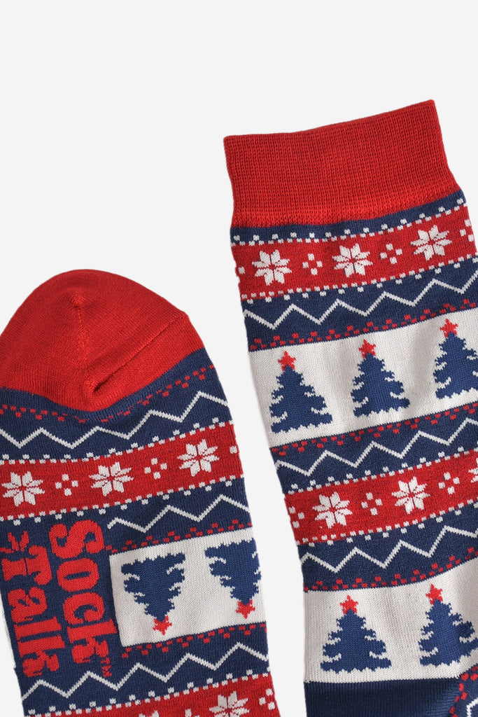 showing the cuff and toe of the socks, both are red in keeping with the colours of the fair isle pattern