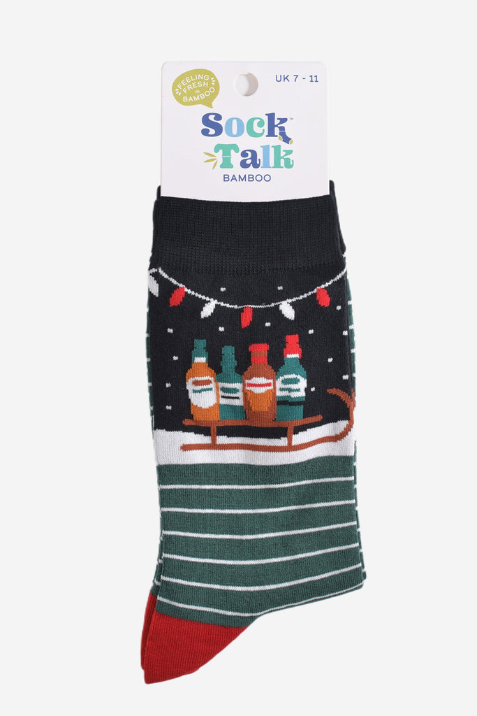 party drinks sledge christmas socks in their sock talk packaging, the socks are a uk size 7-11