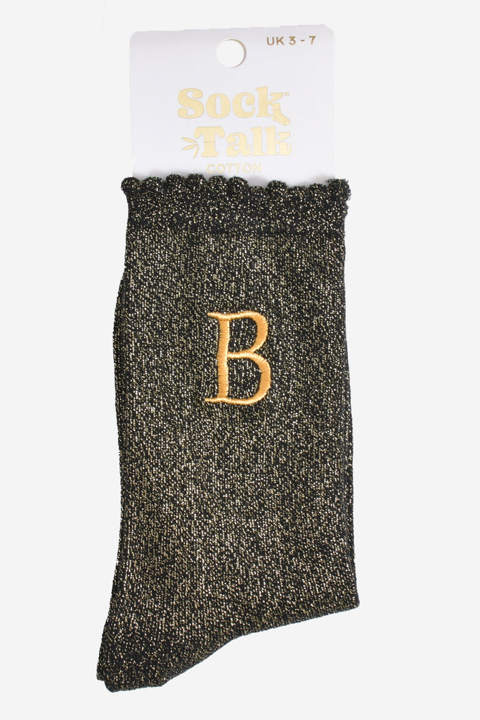 embroidered glitter letter b cotton ankle socks in their sock talk packaging, the socks are a uk size 3-7