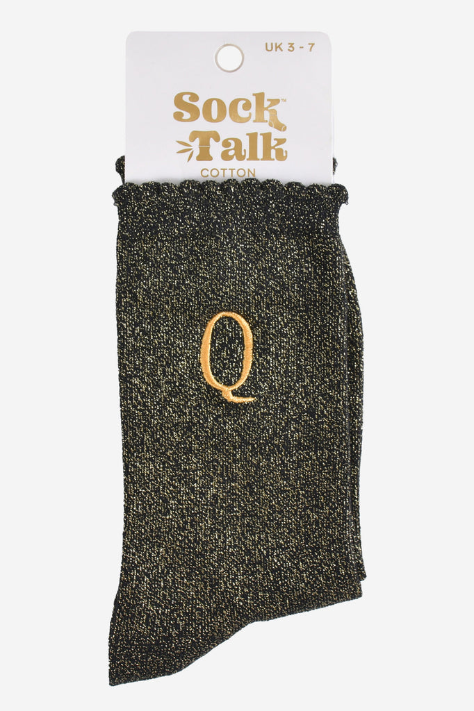 embroidered glitter letter q cotton ankle socks in their sock talk packaging, the socks are a uk size 3-7