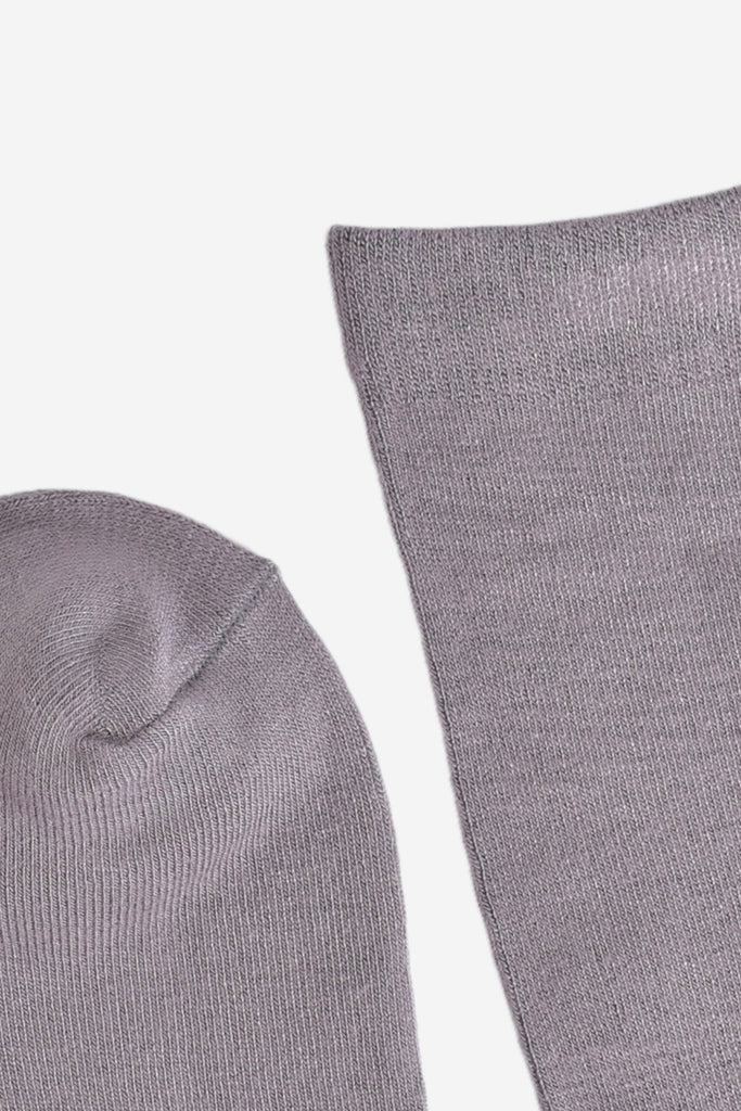 close up of the toe and cuff of the socks, they are the same colour as the body of the socks