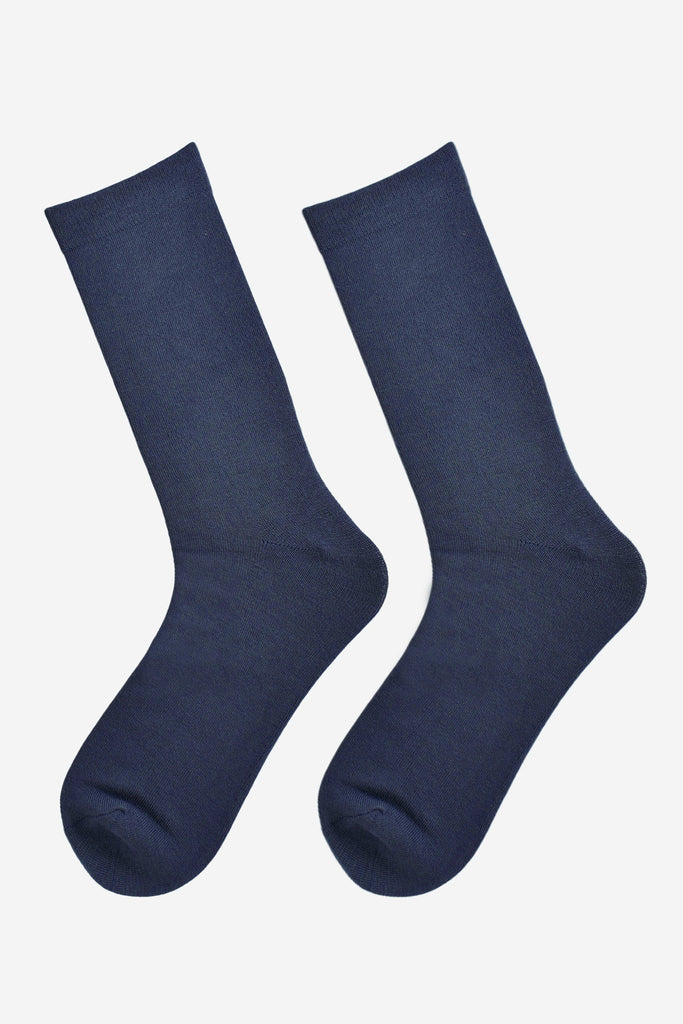 navy blue bamboo socks laying flat, showing the all over consistent colour