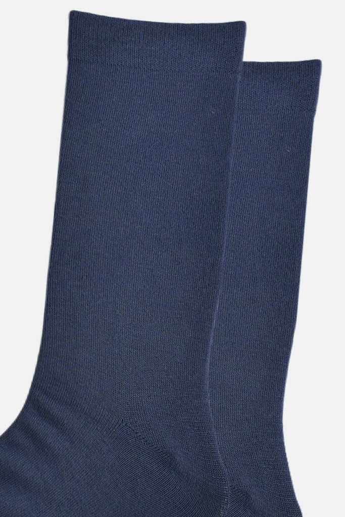 close up of the plain navy blue bamboo socks