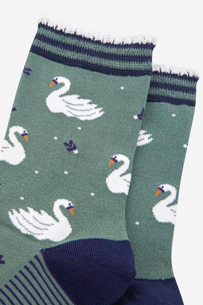 womens-bamboo-socks-sage-green-navy-blue-swans-close-up