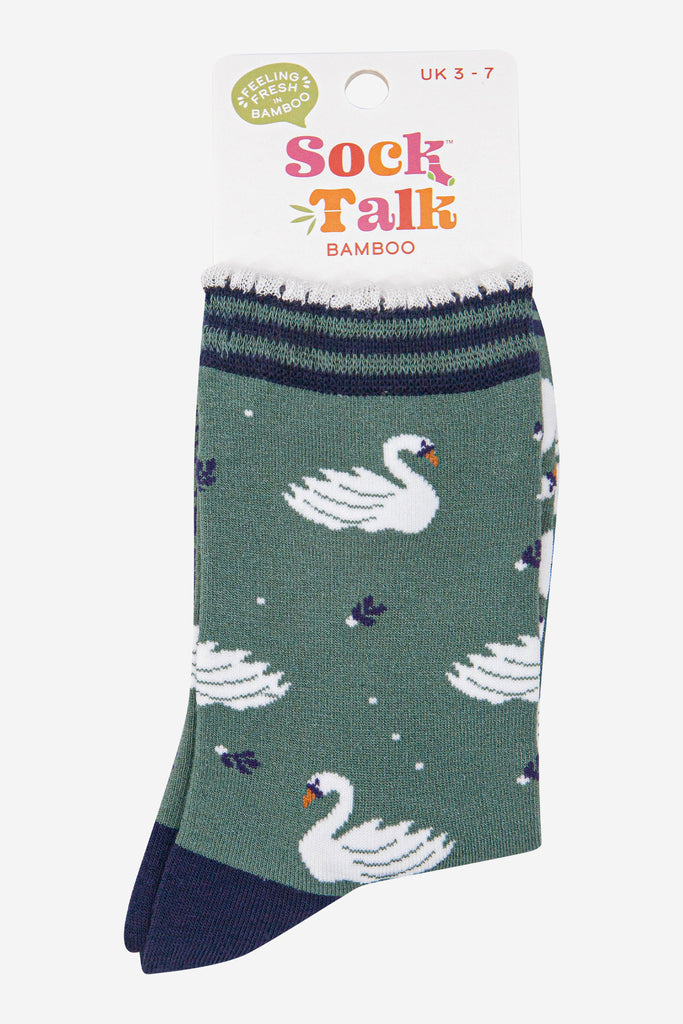 womens-bamboo-socks-sage-green-navy-blue-swans-in-sock-talk-packaging