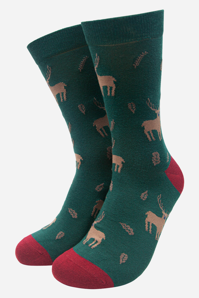 green dress socks with an all over stag and leaf pattern