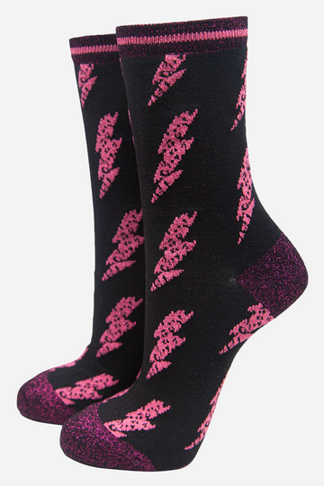 black socks with pink lightning bolts and pink sparkly glitter accents 