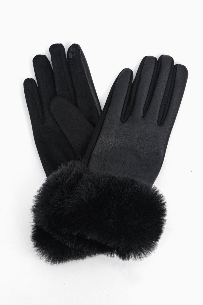 a close up of the faux leather winter gloves showing up close the faux fur trim around the wrists.