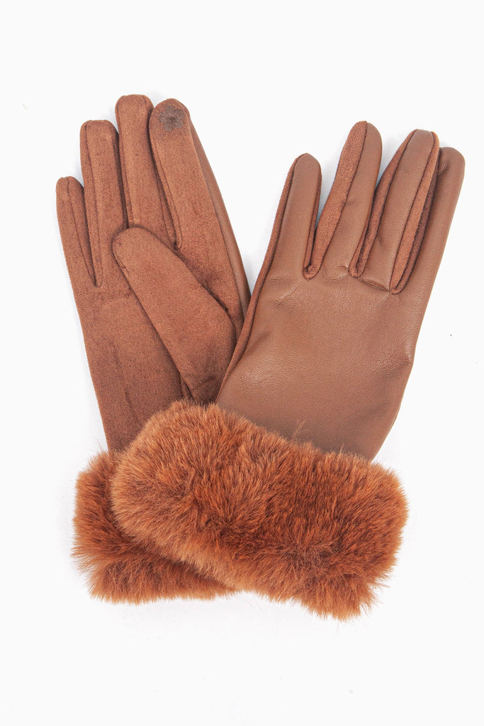 a close up of the faux leather winter gloves showing up close the faux fur trim around the wrists.