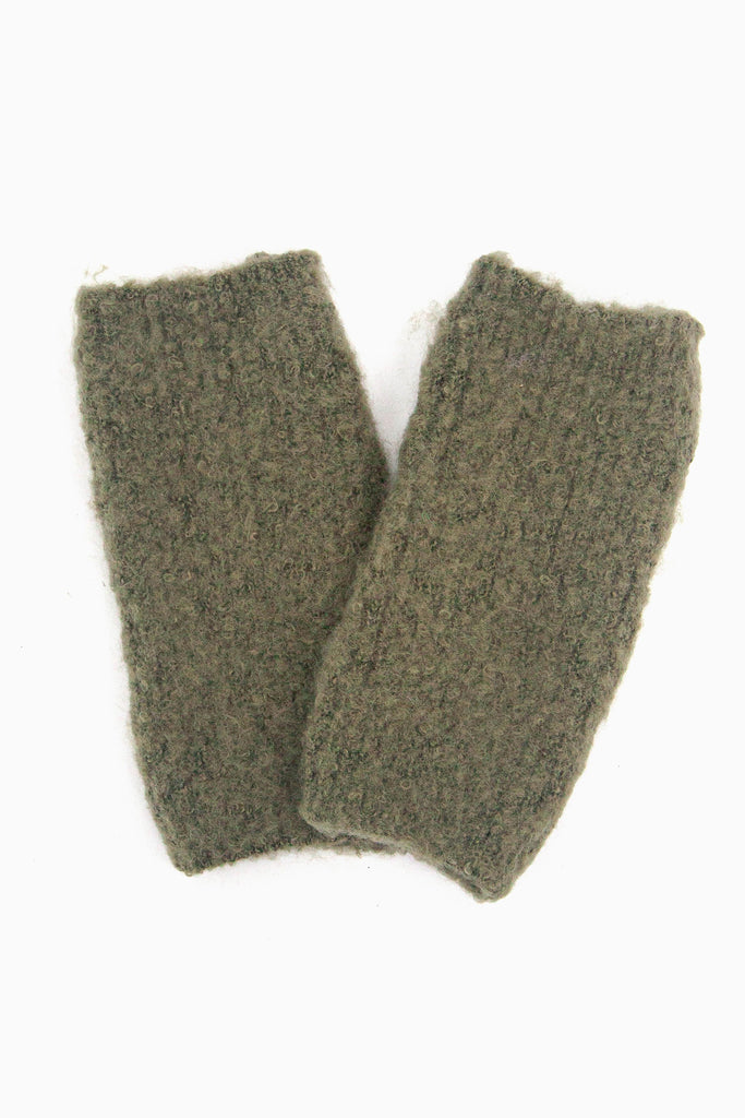 close up of the knitted wrist warmers showing the soft fabric
