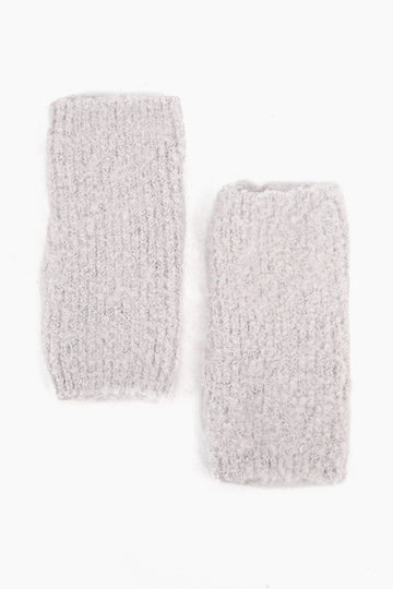 light grey coloured knitted wrist warmers.
