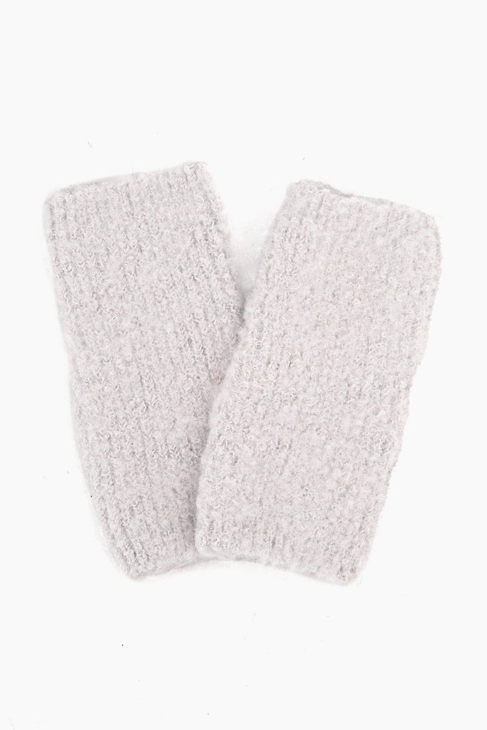 close up of the knitted wrist warmers showing the soft fabric