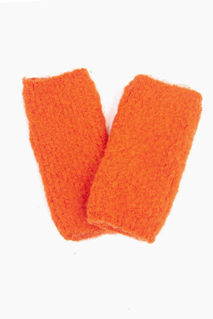close up of the knitted wrist warmers showing the soft fabric