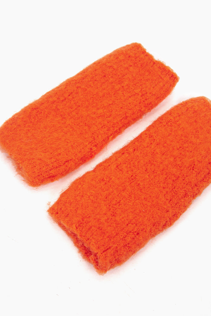 side view of the knitted wrist warmers, showing the opening at each end