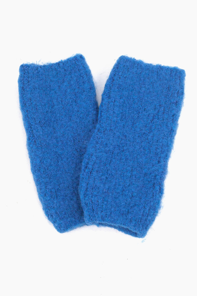 close up of the knitted wrist warmers showing the soft fabric