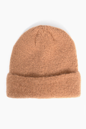 neutral camel textured knitted beanie hat with a foldable brim