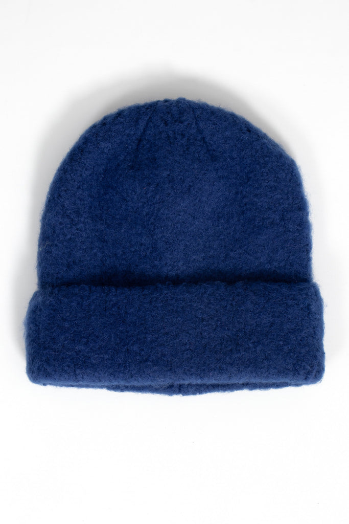 navy blue textured knitted beanie hat with a foldable brim