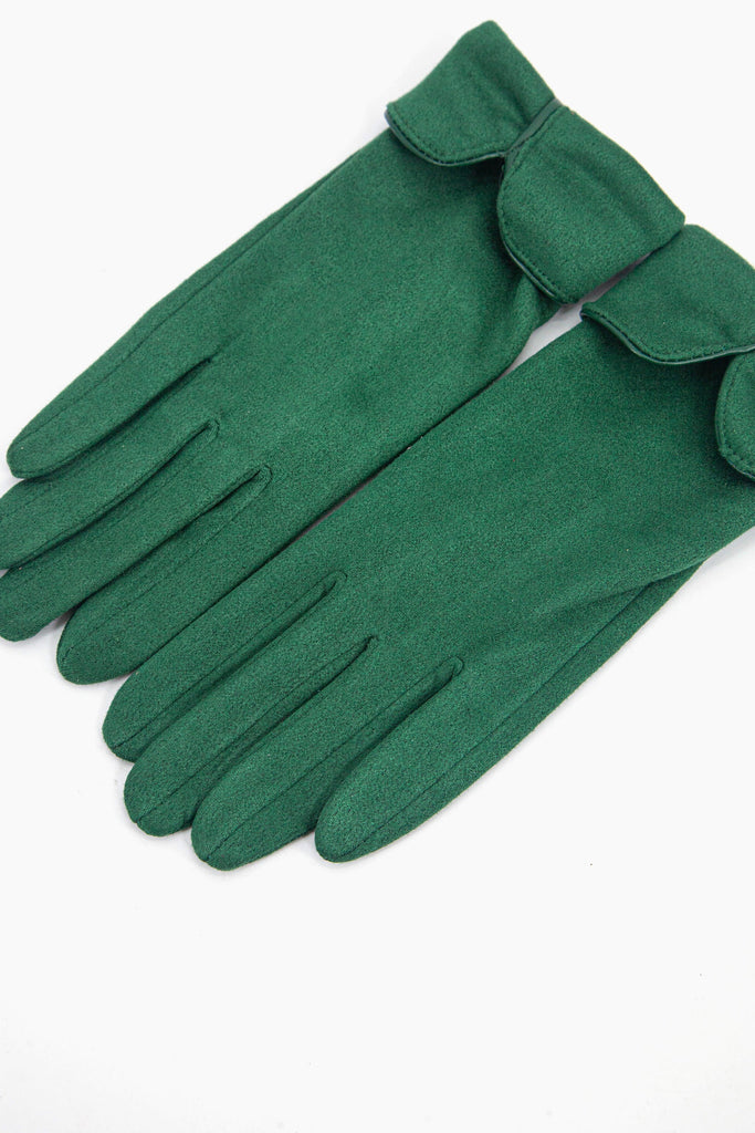 green velvet winter gloves with scalloped fold over cuffs.