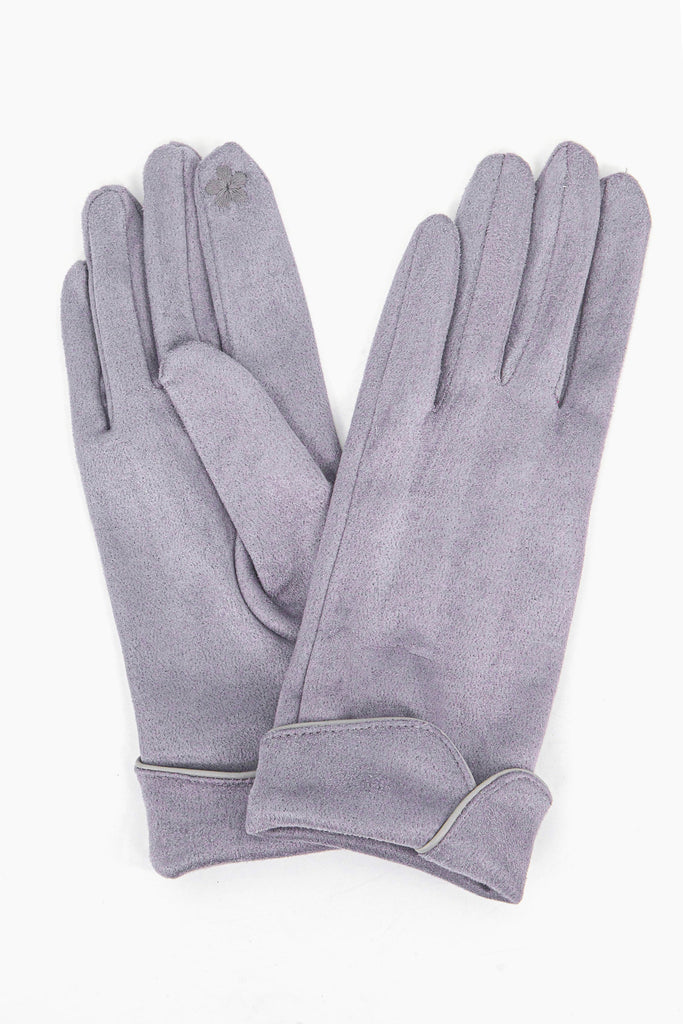 a close up of the grey faux velvet winter gloves showing up close scalloped cuffs.