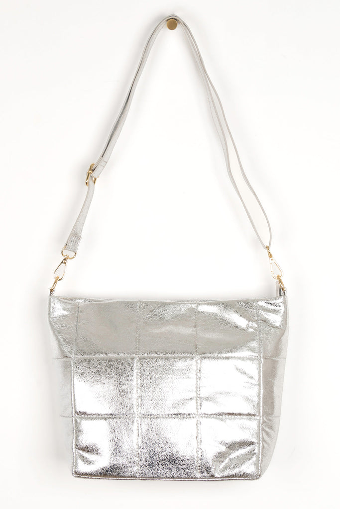 silver cracked faux leather mid size crossbody bag with detachable bag strap and gold hardware