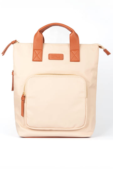 cream back pack with tan brown top carry handles and multiple zip closing compartments