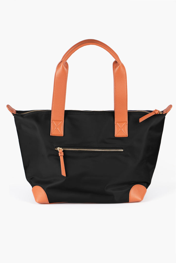 showing the back of the black and brown tote bag, there is a horizontal zip pocket.