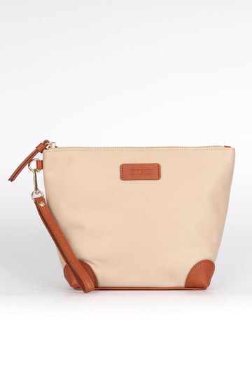 cream coloured vanity bag with tan pleater accents and detachable wrist strap