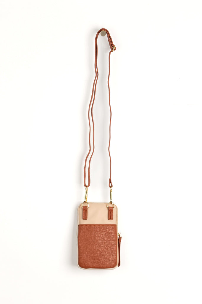 showing the back of the small phone pouch, showing where the removeable crossbody strap attaches to the phone bag