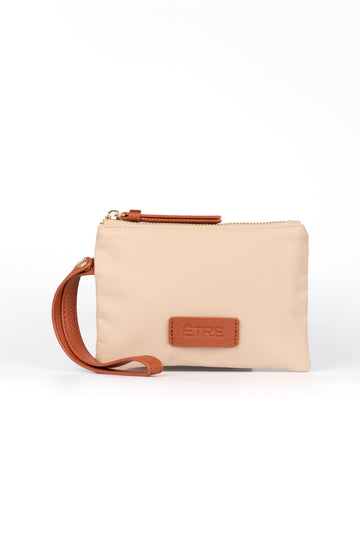 cream wristlet wallet with faux leather tan wrist strap and zip closure