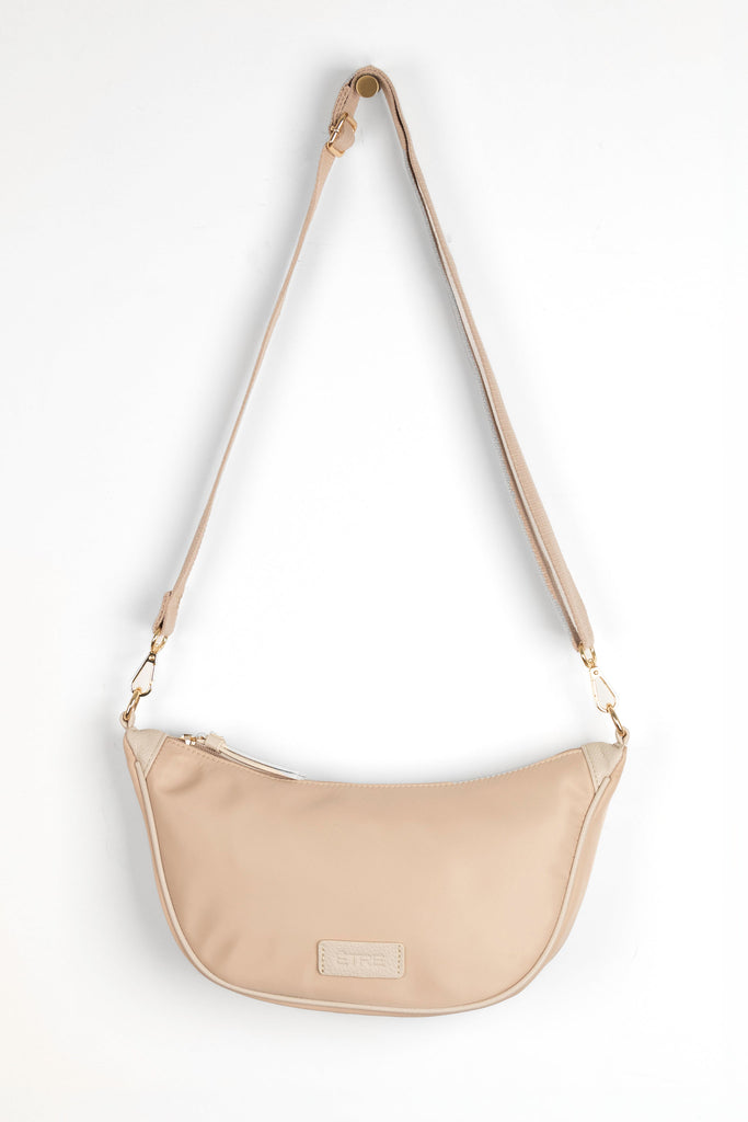  cream sling bag with detachable bag strap