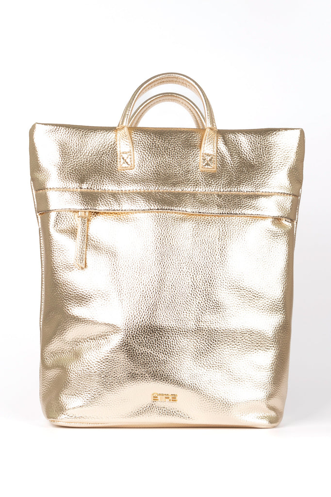 gold metallic back pack with top handles and a zip closure, the bag is made from faux leather PU