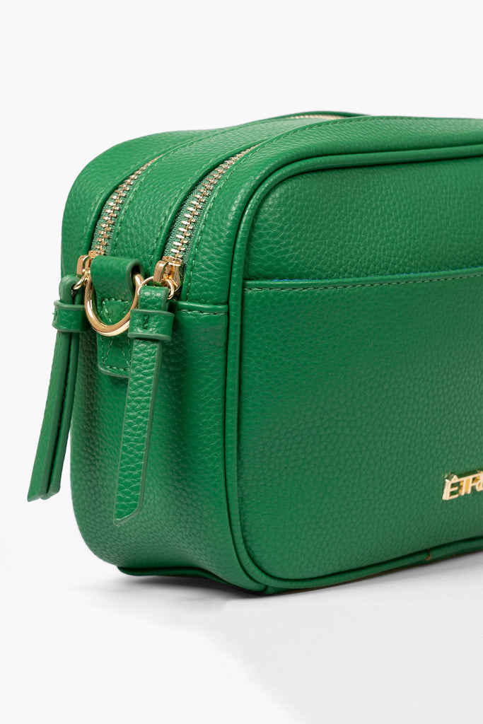 willa-crossbody-bag-green-pebbled-faux-leather-close-up-dual-zip-compartments
