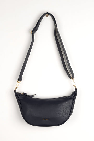 navy blue faux leather crossbody half moon sling bag with detachable bag strap