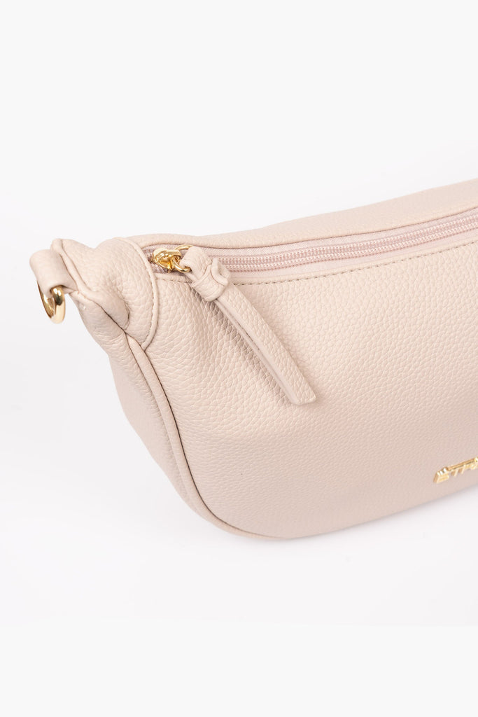 stevie-half-moon-crossbody-bag-nude-pebbled-faux-leather-close-up