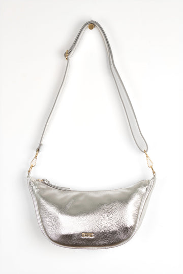 silver faux leather crossbody half moon sling bag with detachable bag strap